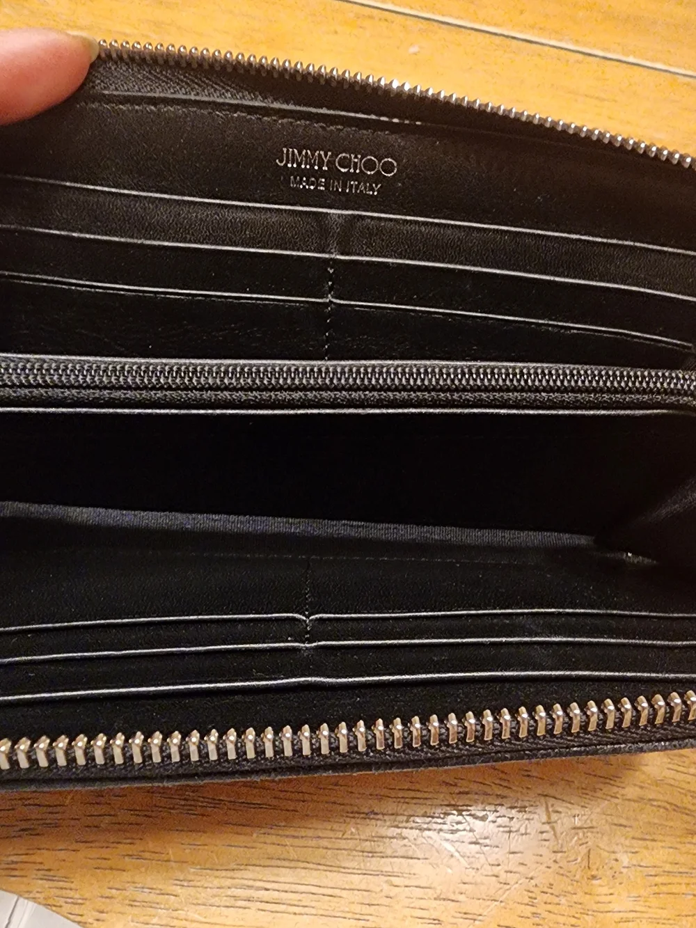 Jimmy Choo Filipa Star Studded Wallet, a black leather zip-around wallet